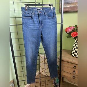 720 High Rise Super Skinny
Size 28